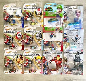 ┥ NUEVOS autos de personajes de Hot Wheels *Star Wars *Disney 100 *Super Mario *Mario Kart - Imagen 1 de 40