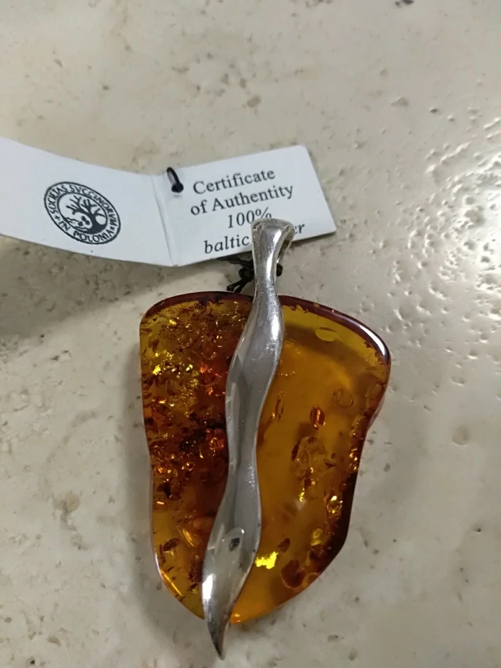 Ciondolo ambra e argento - Immagine 1 di 1