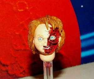 CABEZA DE FIGURA DE ACCIÓN ""CARA SANGRIENTA"" PARA NIÑOS PLAY CHUCKY (NECA) - Imagen 1 de 4