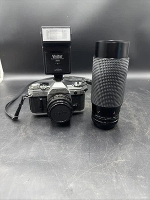 Cámara Canon AT-1 SLR Film 35 mm con Canon con dos lentes y flash Foto 1 de 4