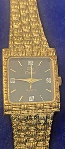 Oleg Cassini Gold Tone Real Diamond Watch With Case Needs Battery - Picture 1 of 5