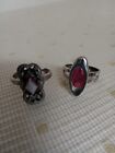 Two Rings. One pink enamel lozenge shape. 1 gothic style pink enamel in centre