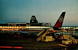 MONTREAL, QUE. CANADA POSTCARD Montreal International Airport, Night View DC8 - Picture 1 of 2