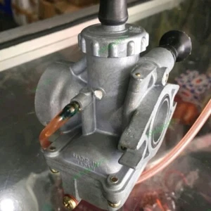 GENUINE New Old Stock Yamaha RX 100 Carburetor Assy 1V1-14101-00 Made In Japan - Picture 1 of 2