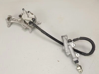 2010-2017 Yamaha YZ450F rear back brake assembly master cylinder caliper - Image 1 of 4