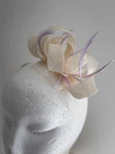 New cream sinamay loop fascinator with purple feathers on a clear comb! - Picture 1 of 7