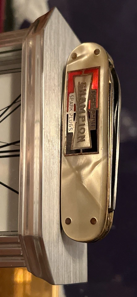 Vin Multi-Blade Mother of Pearl Handle Champion Spark Plug Logo Pocket Knife - Image 1 of 4