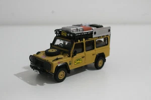 TSM MODEL #108 LAND ROVER DEFENDER 110 CAMEL TROPHY WINNER MINI GT 1/64 #NEW - Picture 1 of 9