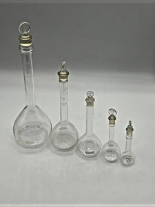 5 Messkolben 10 ml - 25 - 50 - 100 - 250 ml Pyrex Kimax Exax gemischt - Bild 1 von 6