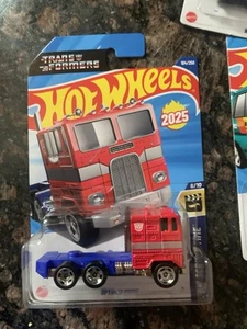 2025 HOT WHEELS NEW MODEL F CASE OPTIMUS PRIME #104 RED TRANSFORMERS AUTOBOTS - Picture 1 of 1