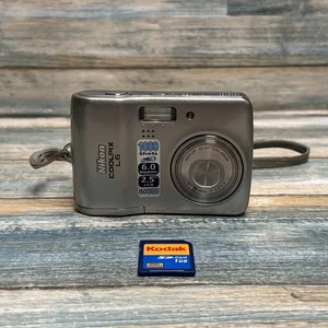 Nikon Coolpix L11 6 6,0 megapixel fotocamera digitale argento con scheda di memoria 1 GB - spedizione veloce - Foto 1 di 6