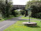 Photo 6x4 Bridge and Signpost Forda The bridge takes a footpath over what c2014