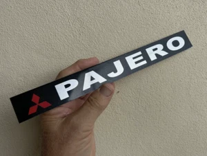 MITSUBISHI PAJERO THIN METAL SCRIPT Badge EMBLEM fit 1996 1997 1998 1999 2000 01 - Picture 1 of 3