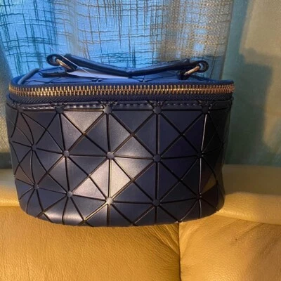 Bolsa de maquillaje Nordstrom pequeña azul con asa  Foto 1 de 4
