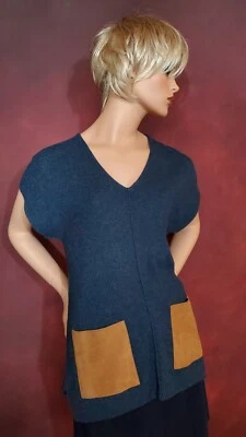 Suéter de punto de manga corta Tommy Bahama para mujer con bolsillos de gamuza genuina pequeño  Foto 1 de 4