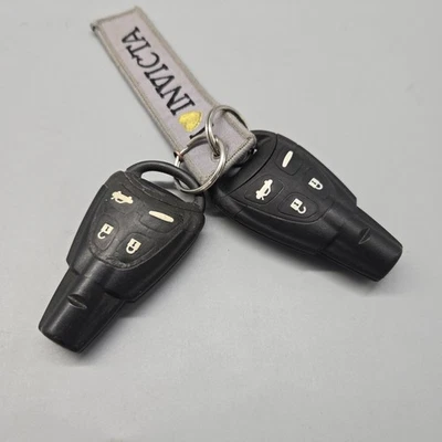 SAAB LOT OF 2 FOBS LTQSAAM433TX OEM 4 Button Key Fob USED, LOCKED - Image 1 of 3