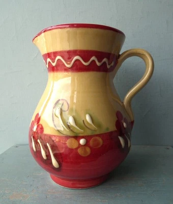 Small pottery jug hand painted slipware floral red yellow Mediterranean Spanish - Image 1 of 4