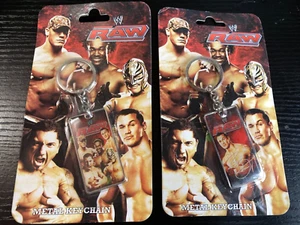 x 2 WWE Wrestling WWE RAW + Randy Orton Schlüsselring roh neu versiegelt - Bild 1 von 4