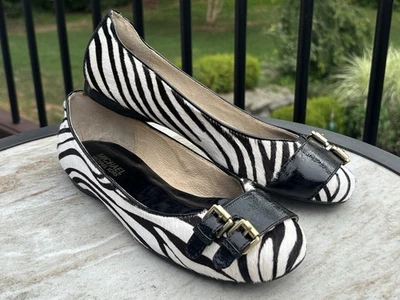 Zapatos planos para mujer Michael Kors con estampado de cebra pelo de becerro 7,5 M usados en excelente estado con caja Foto 1 de 4