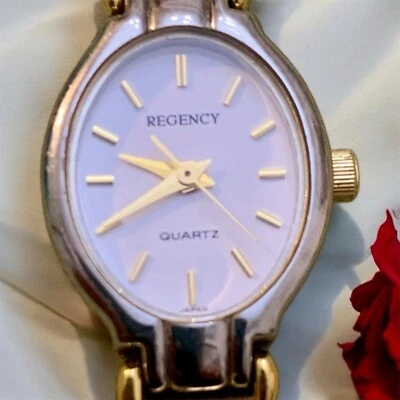 "Reloj Regency para mujer plateado dorado correa de cuarzo precisión #7238 batería nueva usado en excelente estado" Foto 1 de 4