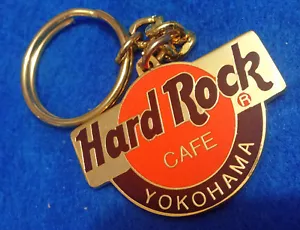 LLAVERO YOKOHAMA DOBLE CARA NARANJA ORO LOGO HRC Hard Rock Café no es un alfiler - Imagen 1 de 1