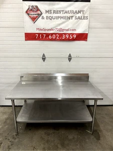 Qualserve 16 Gal. Stainless Steel Table 60Wx34Dx30H w/ Undershelf & 6" B-Splash - Picture 1 of 5