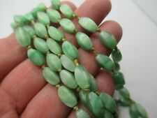 New ListingAntique Art Deco Molded Green Glass Flapper Necklace 56' Opera