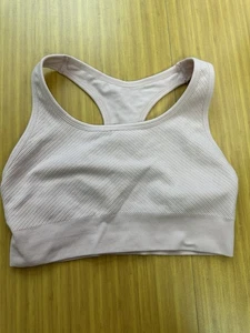 Reggiseno sportivo donna Member's Mark senza cuciture racerback taglia media rosa - Foto 1 di 5