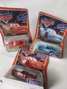 3 Stück Disney Pixar Cars McQueen Set, Dinoco, Dirt Track und Radiator Springs - Bild 1 von 5