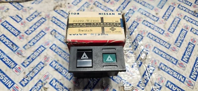 Datsun 77-81  810 NOS Hazard Switch 25290- W2400 - Image 1 of 2