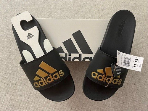 Nuovissimo sandalo slide comodo Adidas Adilette nero oro uomo taglia 11