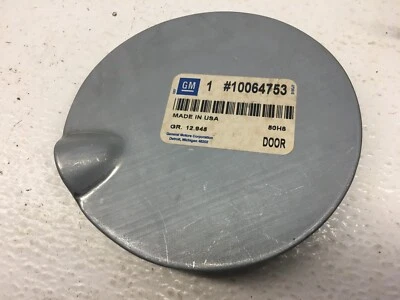 GM NOS 1987-1996 Chevy Beretta Corsica Gas Fuel Filler Door 10064753 Foto 1 de 4