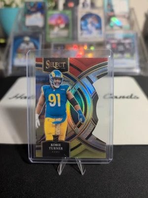 2023 Panini Select - Premier Level Kobie Turner Red & Yellow Prizm Die-Cut (RC) - Image 1 of 2