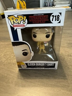 FUNKO POP! 奇怪的东西 #718 ELEVEN(BURGER T 恤)NETFLIX 电视 — 第 1/4 张图片
