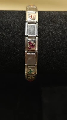 Pulsera Zoppini italiana vintage segmentada elástica con 11 dijes 19 eslabones Foto 1 de 4