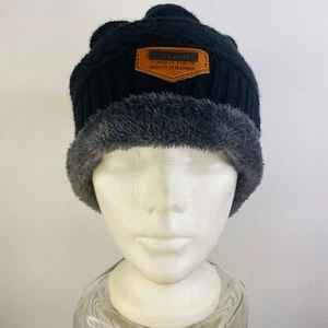 Gorro de invierno Hindawi tejido negro forrado de piel sintética reversible - Imagen 1 de 3