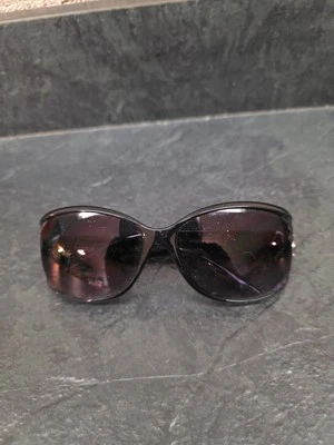 Gafas de sol Foster Grant Maxblock SUBLIME marco negro lente púrpura decoración plateada Foto 1 de 4