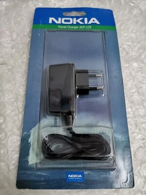 CARICABATTERIE NOKIA ACP-12E ORIGINALE NUOVO PER TELEFONI NOKIA - Immagine 1 di 2