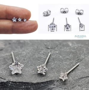 Orecchini a stella con zircone bianco da donna in acciaio inossidabile per lobo - Foto 1 di 10