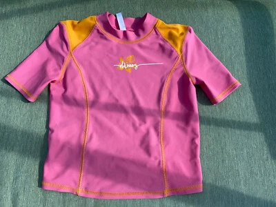 Top de natación de surf para niñas rosa marino con costuras naranjas protector contra erupciones talla S usado en excelente estado  Foto 1 de 4