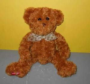 Peluche clásico dorado de felpa de peluche de 12" Bear Dakin Cuddles con arco con estampado de patas - Imagen 1 de 2