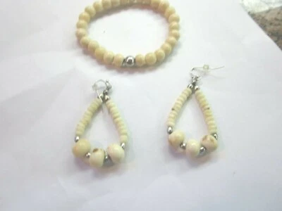 **Pendientes de aro BONE y pulsera de cuentas de plata Foto 1 de 3