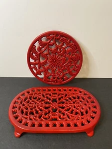 Lot of 2 Red Enamel Coated Cast Iron Trivets Footed Kitchen Oval and Round - Picture 1 of 2