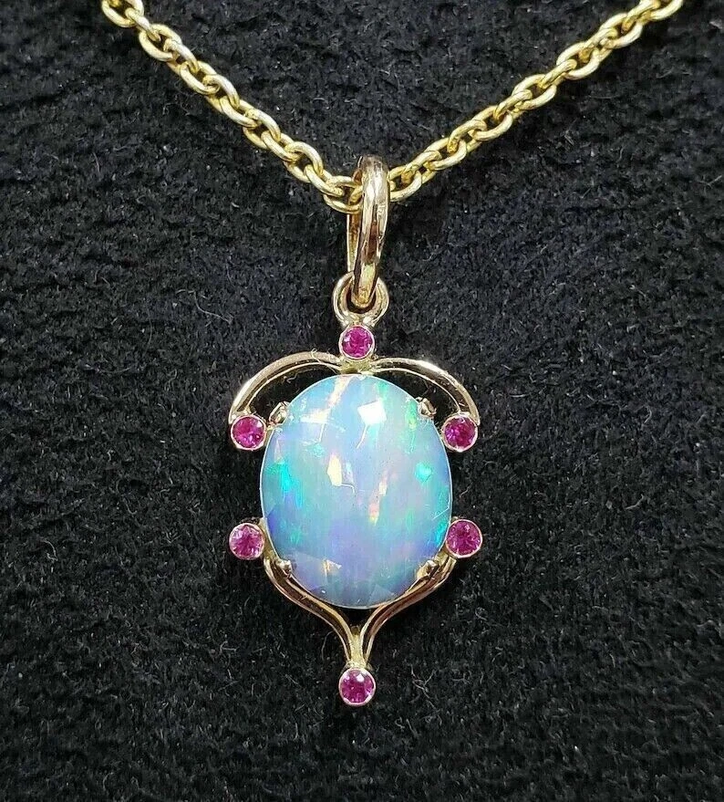 Oval Cut Simulated Fire Opal Women's Stunning Pendant In 14k Yellow Gold Plated - Image 1 of 4