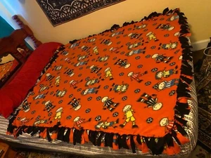 Soccer Fleece blanket, double-sided, hand-tied , black backing, 63" by 55"  - Picture 1 of 10