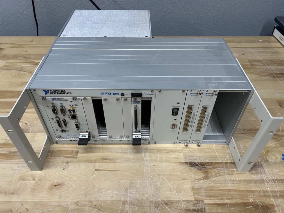 National Instruments PXI-1010/SCXI con NI PXI-8186 y PXI-6509 y SCXI-1128 Foto 1 de 4