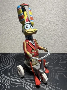 Vintage Schylling Duck On Bike Wind-Up Toy Pedal Cap Propeller Printed Tin - Picture 1 of 3