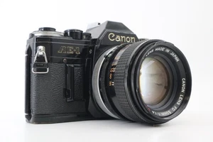 [EXC++++] Canon AE-1 fotocamera reflex pellicola 35 mm nera obiettivo FD 50 mm F1.4 ssc dal GIAPPONE - Foto 1 di 10