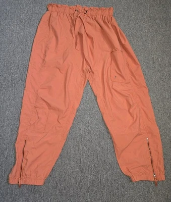 Free People Movimiento Primavera Trekker Pantalones Bolsa de Papel Cintura Cremallera Tobillo Naranja L Foto 1 de 4