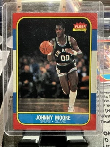 Baloncesto Fleer 1986-87 edición Premier # 76 Johnny Moore casi nuevo excelente - Imagen 1 de 2